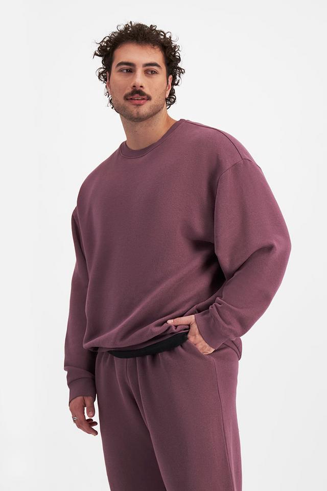 Sam (He/Him) wears size XL and is 178cm tall with 112cm chest