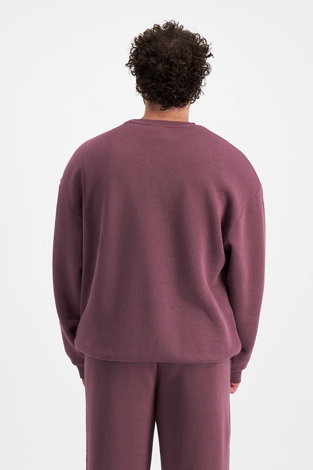 Sam (He/Him) wears size XL and is 178cm tall with 112cm chest