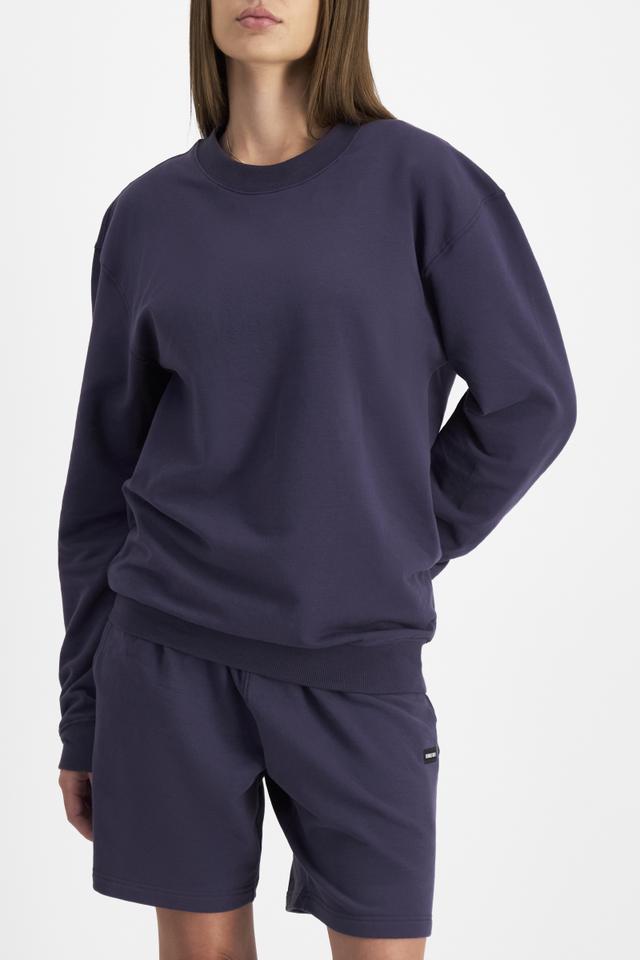 India (She/Her) wears size M and is 180cm tall with 88cm chest and 26cm waist