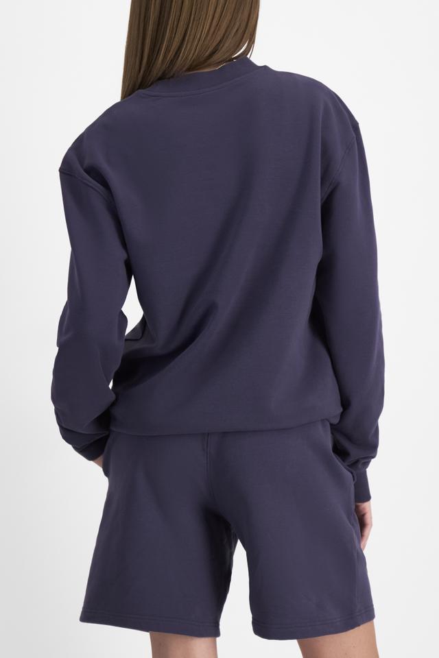 India (She/Her) wears size M and is 180cm tall with 88cm chest and 26cm waist