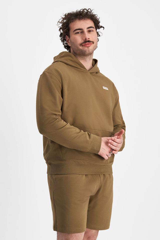 Sam (He/Him) wears size XL and is 178cm tall with 112cm chest
