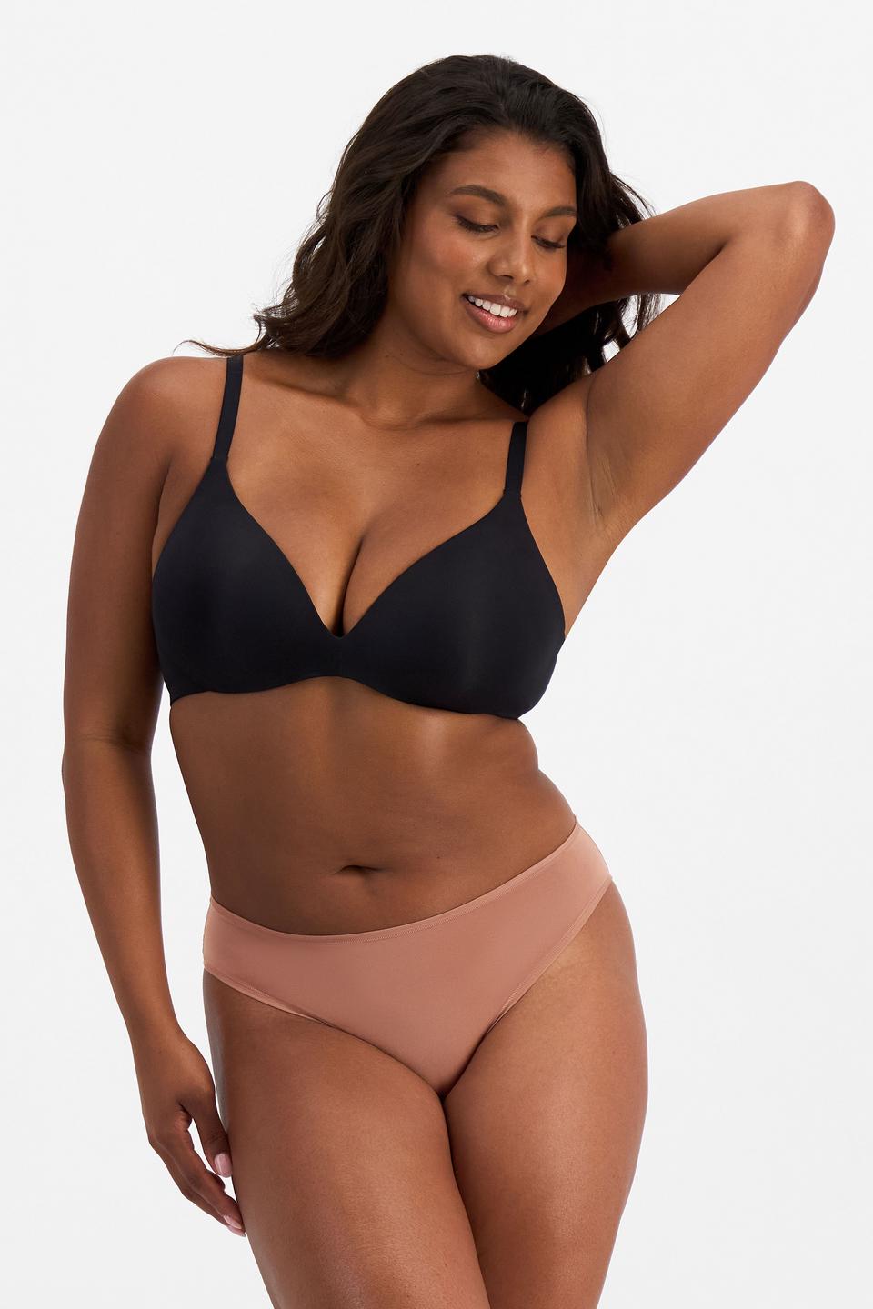 Camryn (She/Her) wears size 10 and is 177cm tall with 95cm chest and 74cm waist