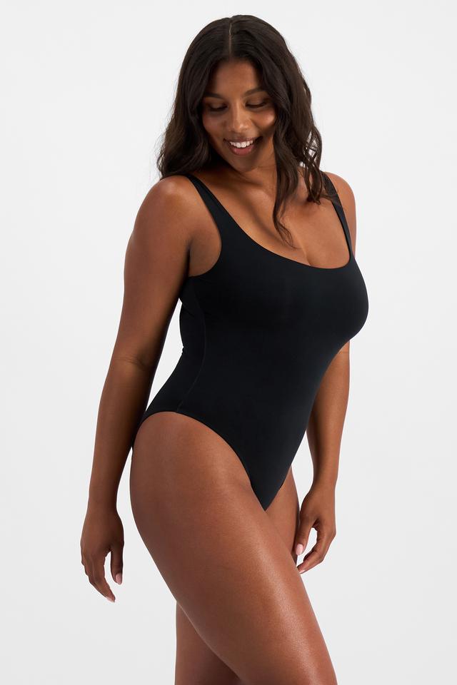 Camryn (She/Her) wears size 12B and is 106cm tall with 95cm chest and 74cm waist