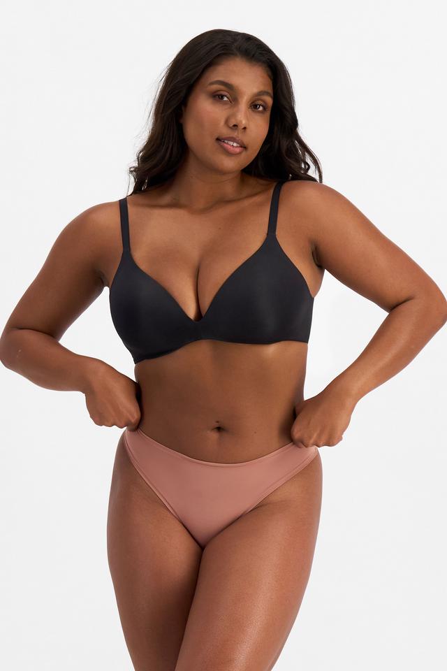Camryn (She/Her) wears size 10 and is 106cm tall with 95cm chest and 74cm waist