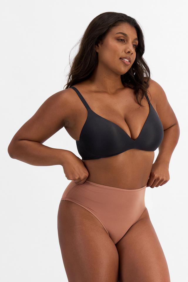 Camryn (She/Her) wears size 10 and is 106cm tall with 95cm chest and 74cm waist