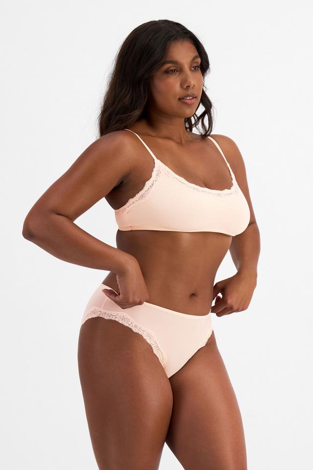 Camryn (She/Her) wears size 10 and is 177cm tall with 95cm chest and 74cm waist
