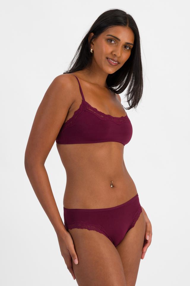 NAYA (She/Her) wears size 10 and is 174cm tall with 80cm chest and 63cm waist