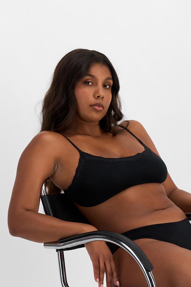 Camryn (She/Her) wears size 10 and is 177cm tall with 95cm chest and 74cm waist