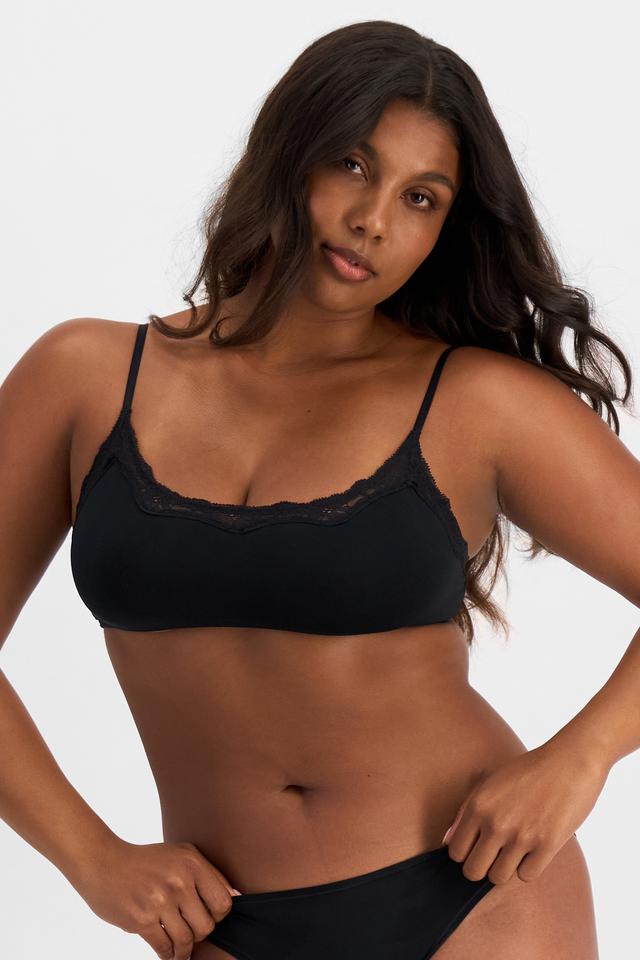 Camryn (She/Her) wears size 12B and is 177cm tall with 95cm chest and 74cm waist