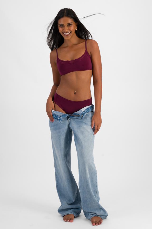 NAYA (She/Her) wears size 12 and is 174cm tall with 80cm chest and 63cm waist