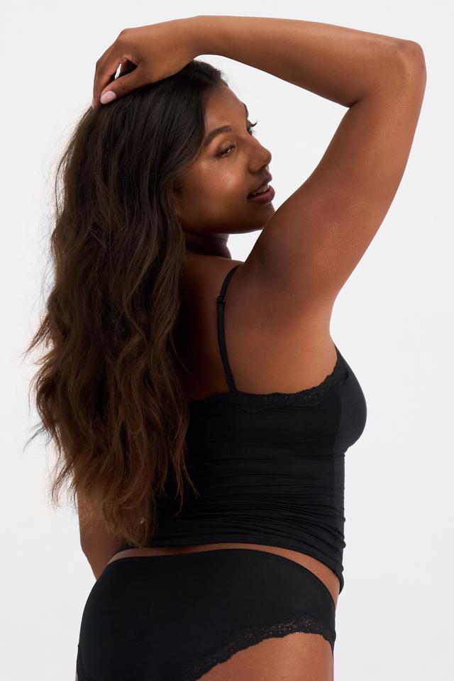 Camryn (She/Her) wears size 12B and is 106cm tall with 95cm chest and 74cm waist