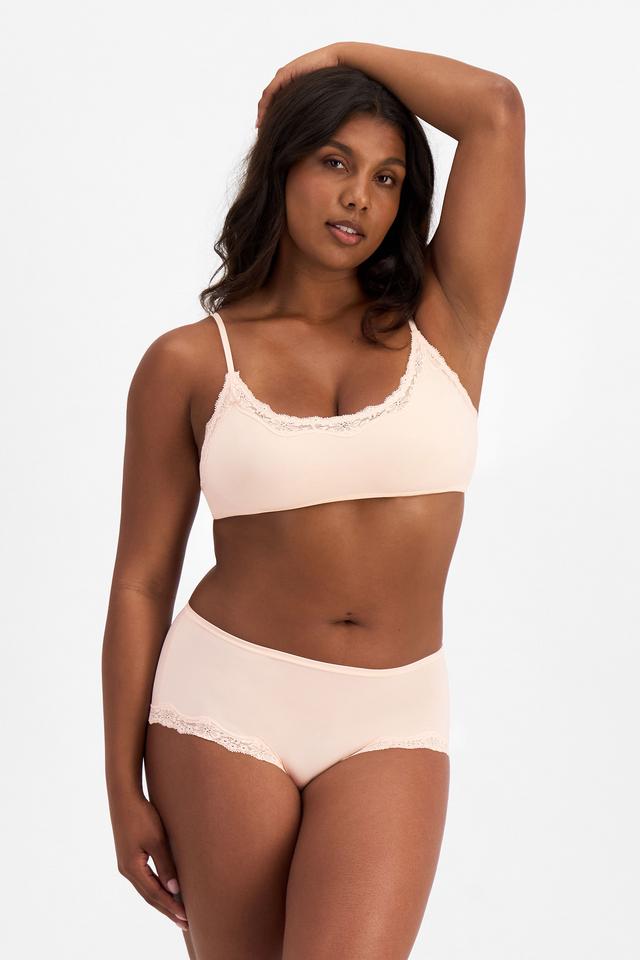 Camryn (She/Her) wears size 10 and is 106cm tall with 95cm chest and 74cm waist