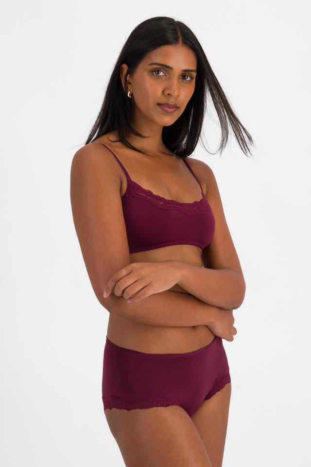 NAYA (She/Her) wears size 10 and is 174cm tall with 80cm chest and 63cm waist
