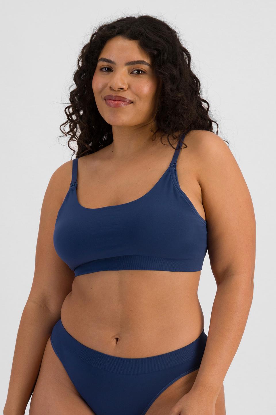 Laura (She/Her) wears size 14 and is 165cm tall with 94cm chest and 76cm waist