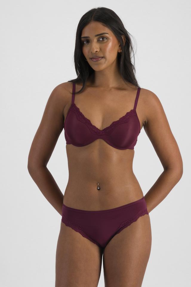 NAYA (She/Her) wears size 12B and is 174cm tall with 80cm chest and 63cm waist