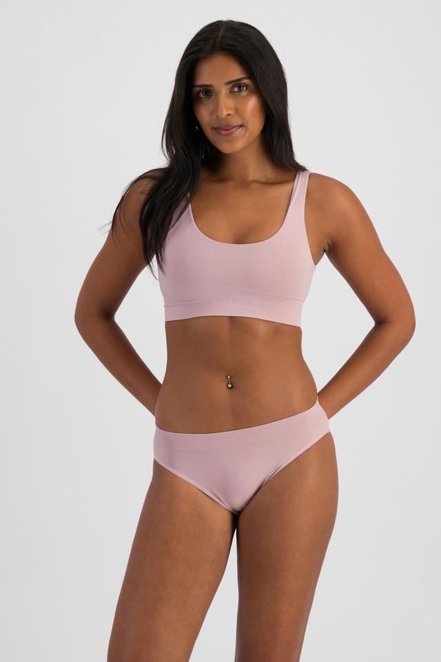 NAYA (She/Her) wears size 10 and is 174cm tall with 80cm chest and 63cm waist