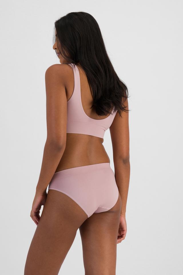 NAYA (She/Her) wears size 10 and is 174cm tall with 80cm chest and 63cm waist