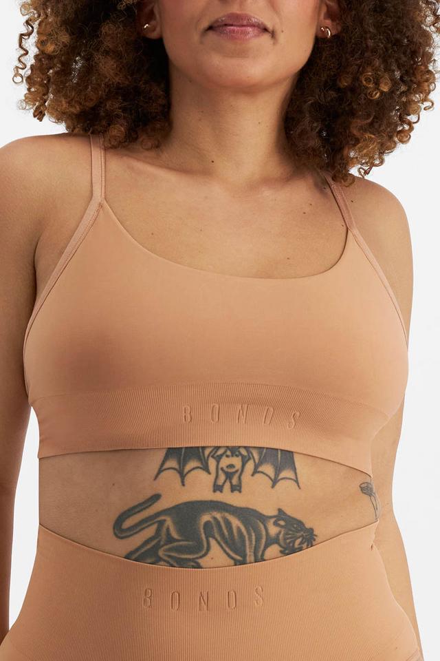 Model wears size 14, is 153cm tall with 93cm bust and 108cm waist