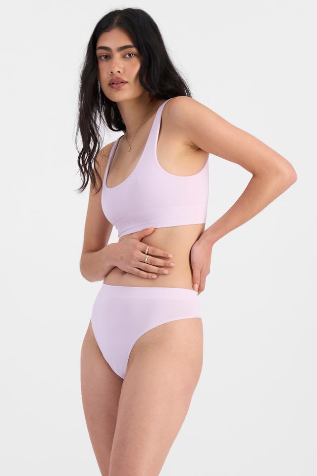Tiana (She/Her) wears size 10 and is 176cm tall with cm chest and cm waist