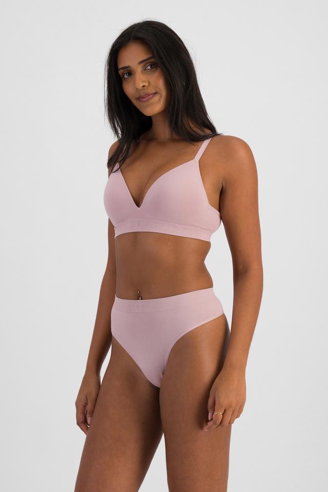 NAYA (She/Her) wears size 10 and is 174cm tall with 80cm chest and 63cm waist
