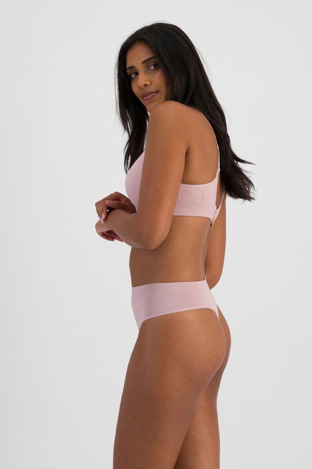 NAYA (She/Her) wears size 10 and is 174cm tall with 80cm chest and 63cm waist
