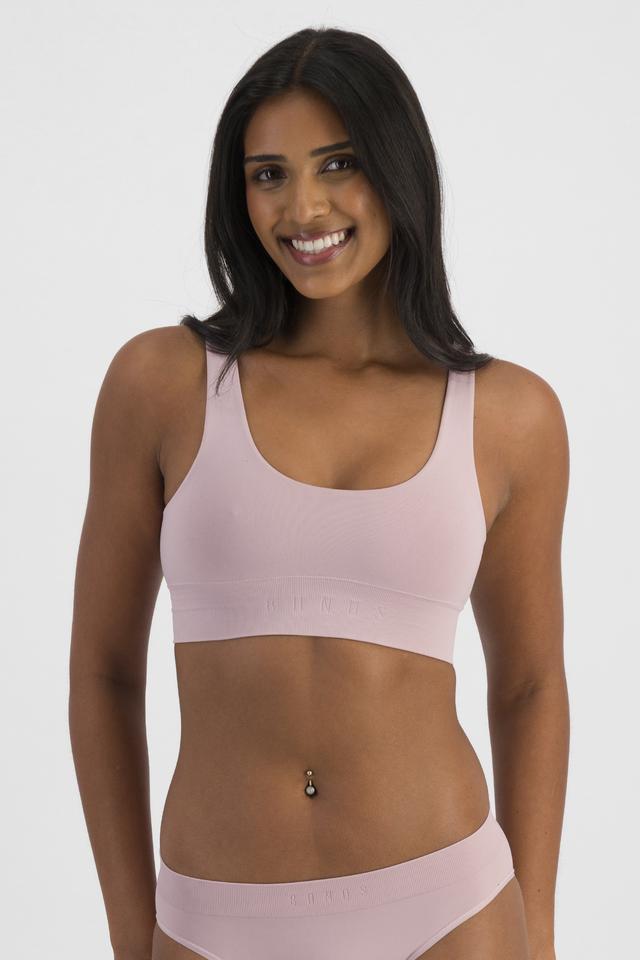 NAYA (She/Her) wears size 12 and is 174cm tall with 80cm chest and 63cm waist