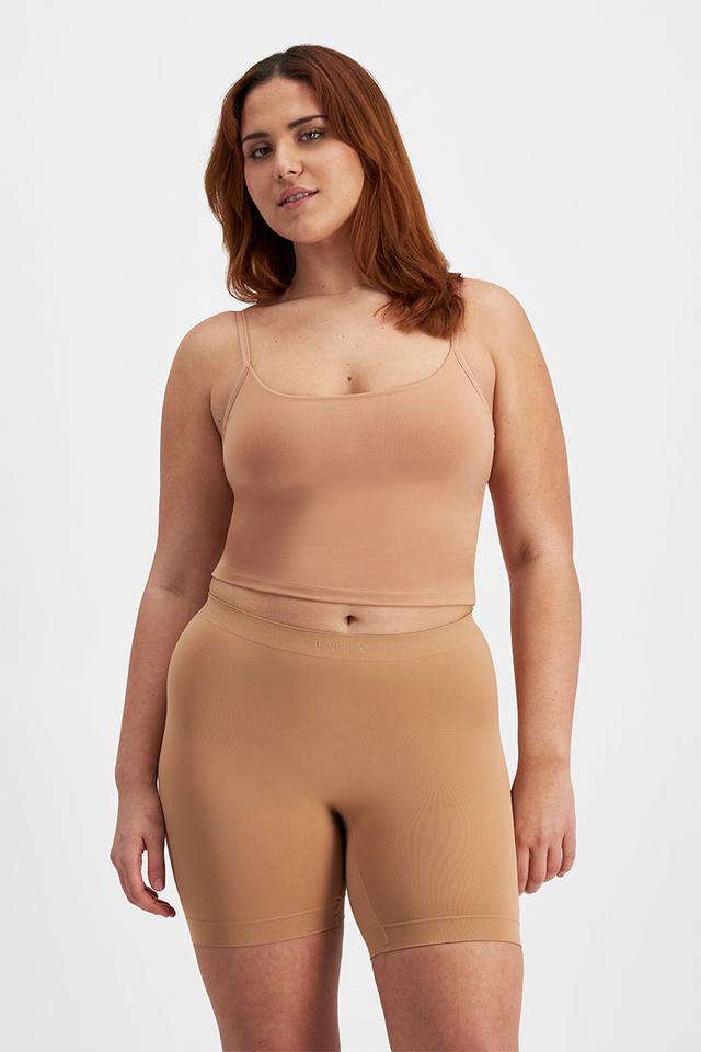 Bella (She/Her) wears size 14 is 173cm tall with 95cm bust 77cm waist and 106cm hip.