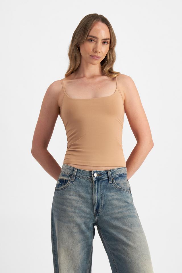 Mikaela (She/Her) wears size S and is 177cm tall with 89cm chest and 66cm waist