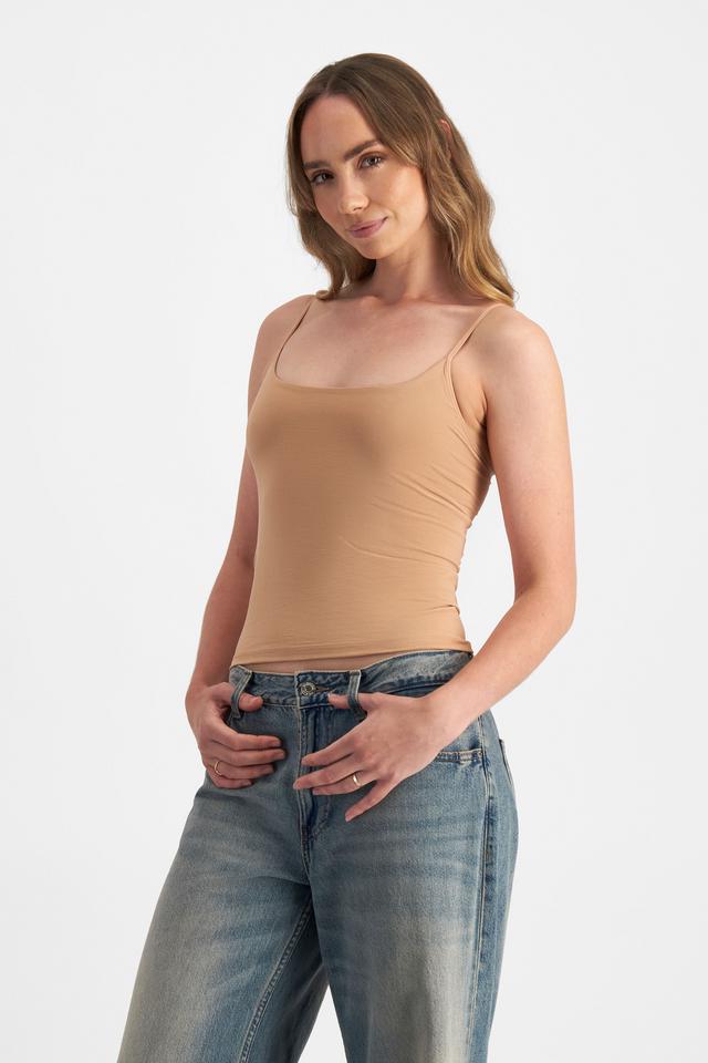 Mikaela (She/Her) wears size S and is 177cm tall with 89cm chest and 66cm waist