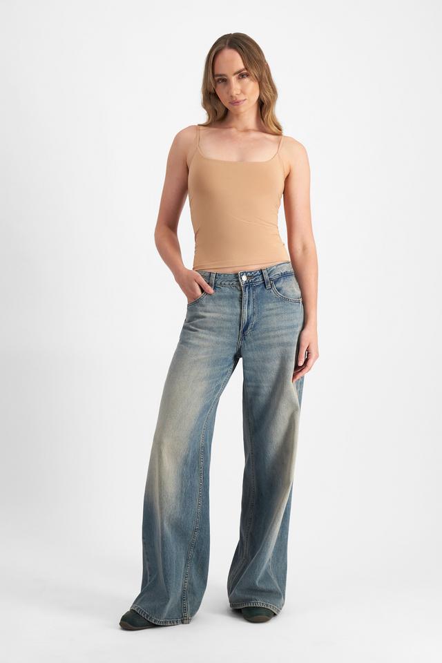 Mikaela (She/Her) wears size S and is 177cm tall with 89cm chest and 66cm waist