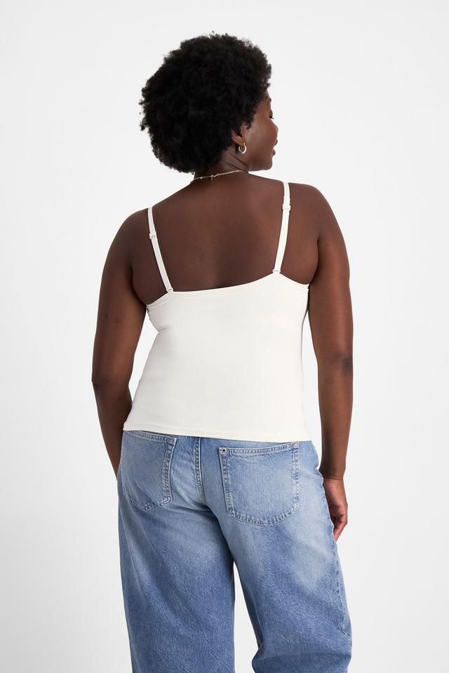 Nelly (She/Her) wears size 14 and is 173.73cm tall with 102cm chest and 84cm waist