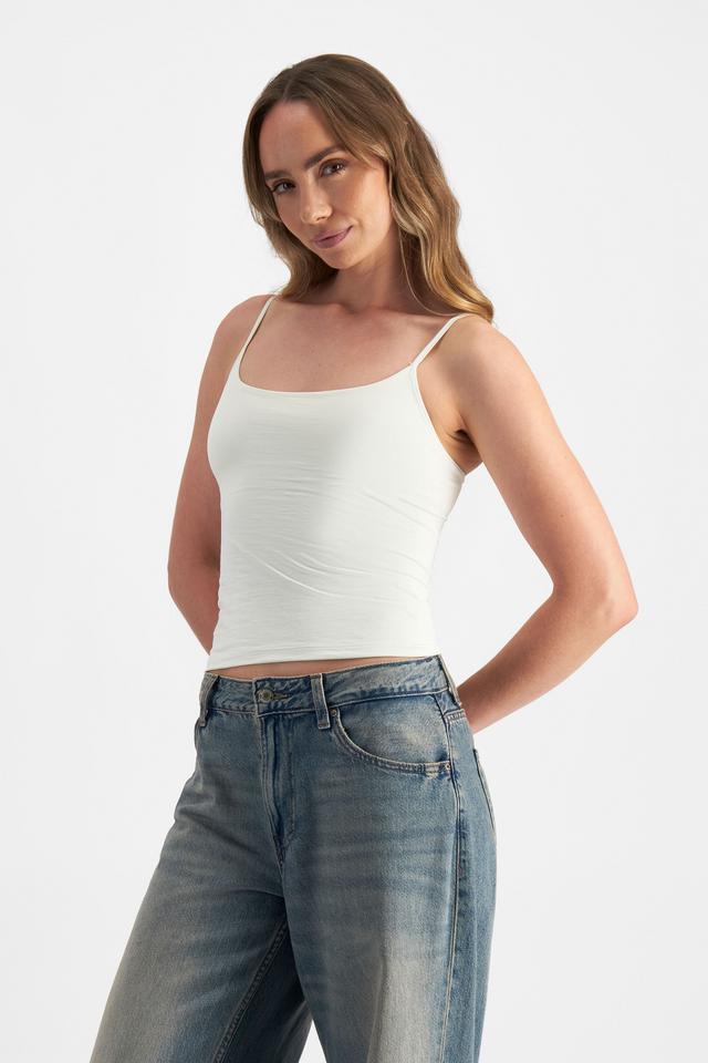 Mikaela (She/Her) wears size S and is 177cm tall with 89cm chest and 66cm waist