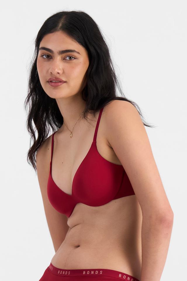 Tiana (She/Her) wears size 12B and is 176cm tall with cm chest and cm waist