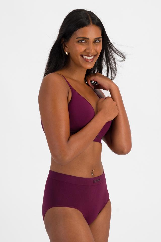NAYA (She/Her) wears size 10 and is 174cm tall with 80cm chest and 63cm waist