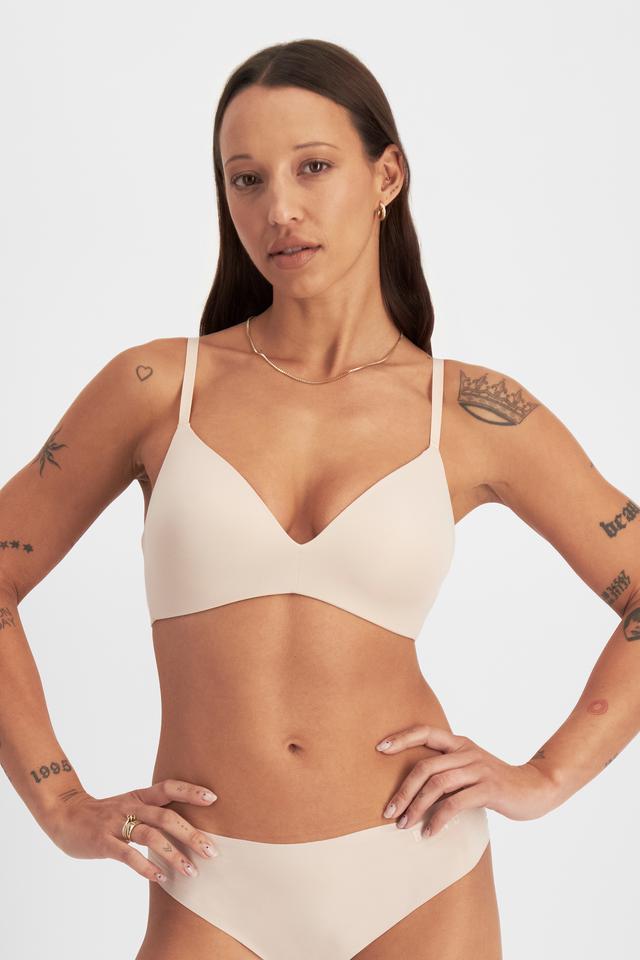 Mon (She/Her) wears size 10 and is 165cm tall with 84cm chest and 63cm waist