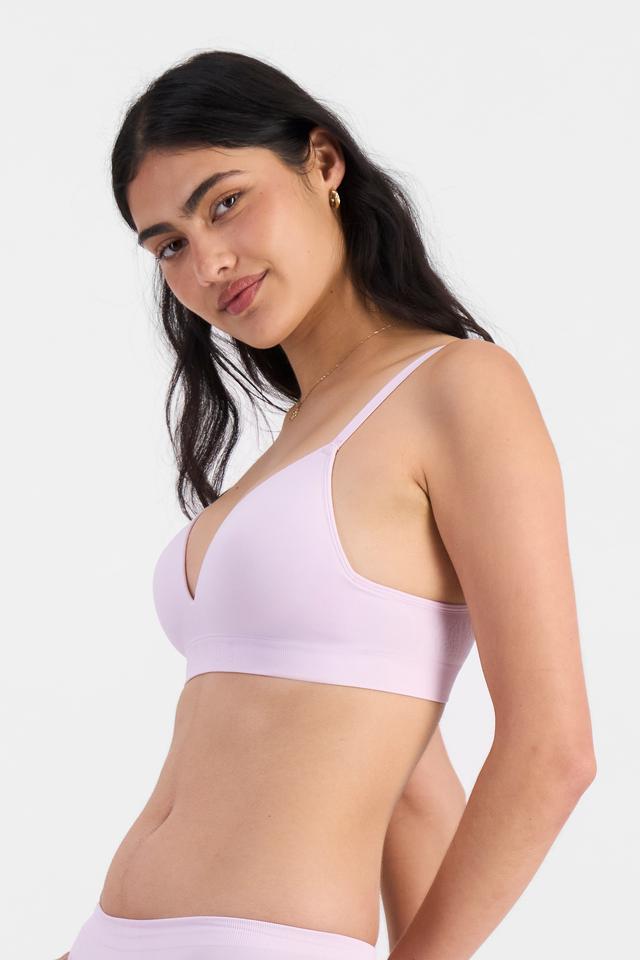 Tiana (She/Her) wears size 12B and is 176cm tall with cm chest and cm waist