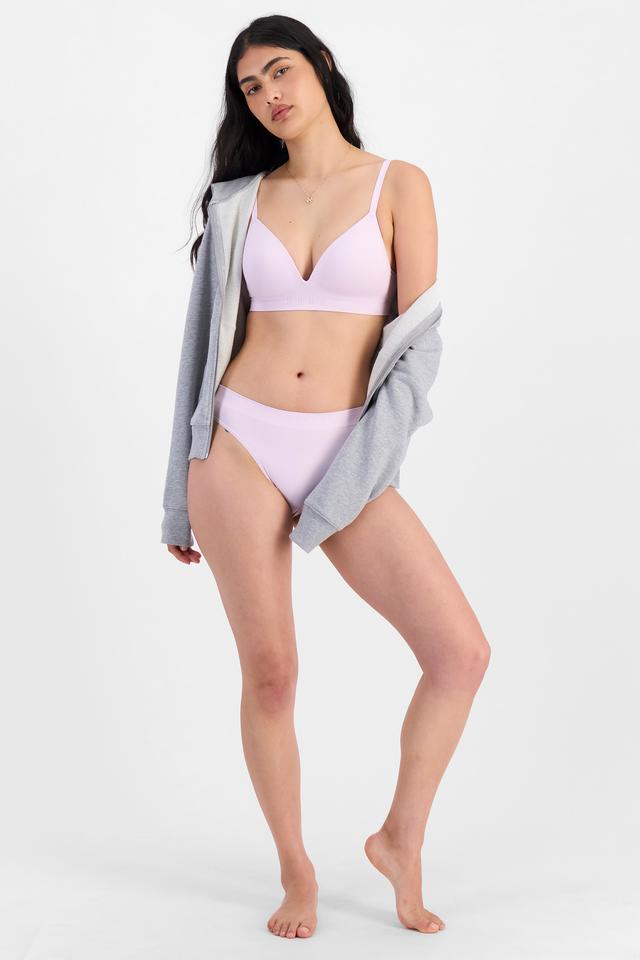 Tiana (She/Her) wears size 12B and is 176cm tall with cm chest and cm waist