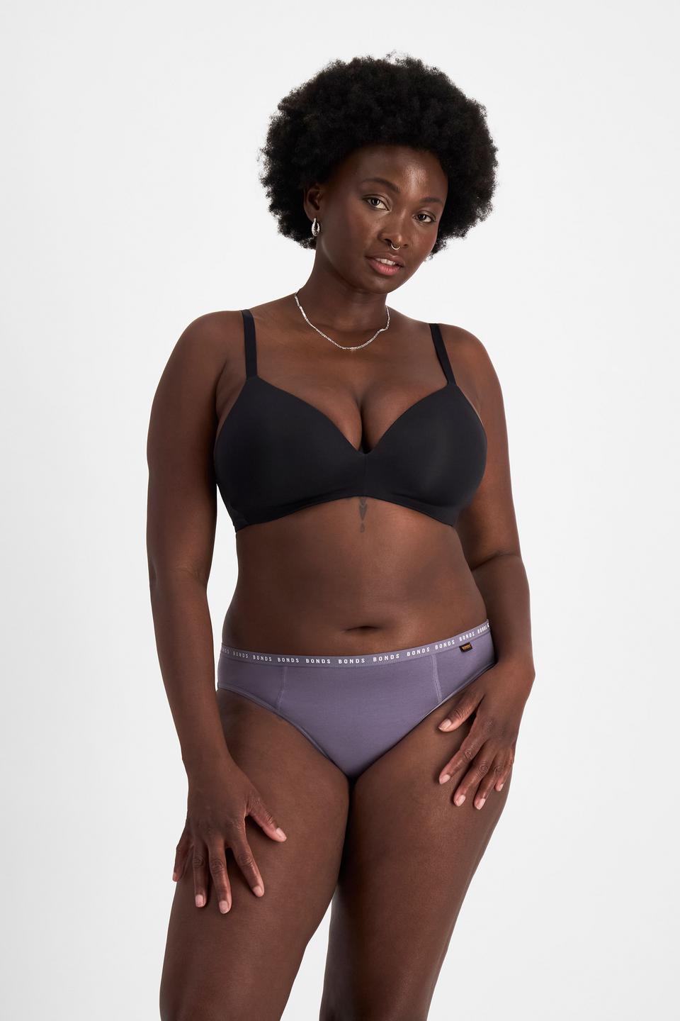 Nelly (She/Her) wears size 14 and is 173.73cm tall with 102cm chest and 84cm waist