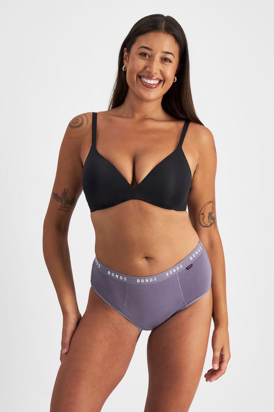 Leah (She/Her) wears size L and is 185cm tall with cm chest and cm waist