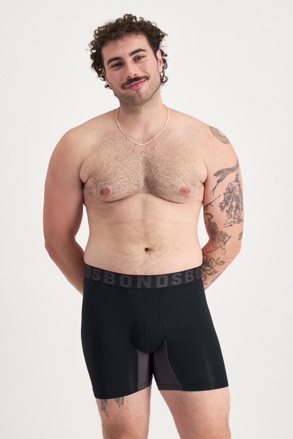 Sam (He/Him) wears size XL and is 178cm tall with 112cm chest