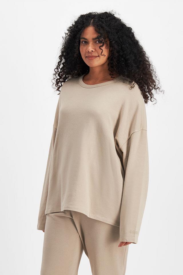 Larissa (She/Her) wears size Large and is 170.18cm tall with 90.17cm chest and 79.756cm waist
