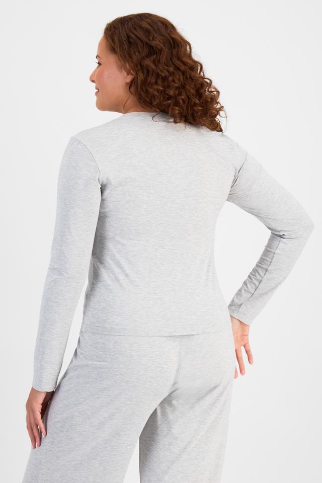 Cameron (She/Her) wears size L and is 179cm tall with 91cm chest and 74cm waist
