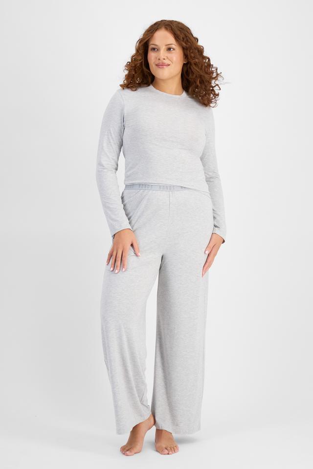 Cameron (She/Her) wears size L and is 179cm tall with 91cm chest and 74cm waist