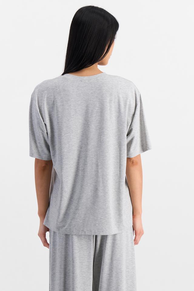 Nancy (She/Her) wears size S and is 170cm tall with 82cm chest and 64cm waist