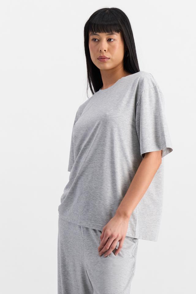 Nancy (She/Her) wears size S and is 170cm tall with 82cm chest and 64cm waist