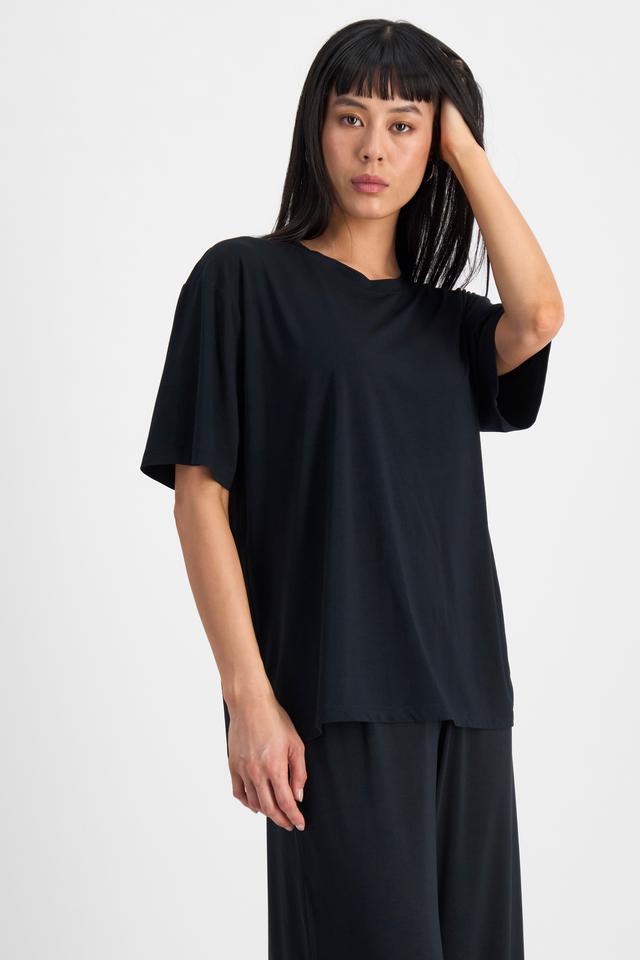 Nancy (She/Her) wears size S and is 170cm tall with 82cm chest and 64cm waist