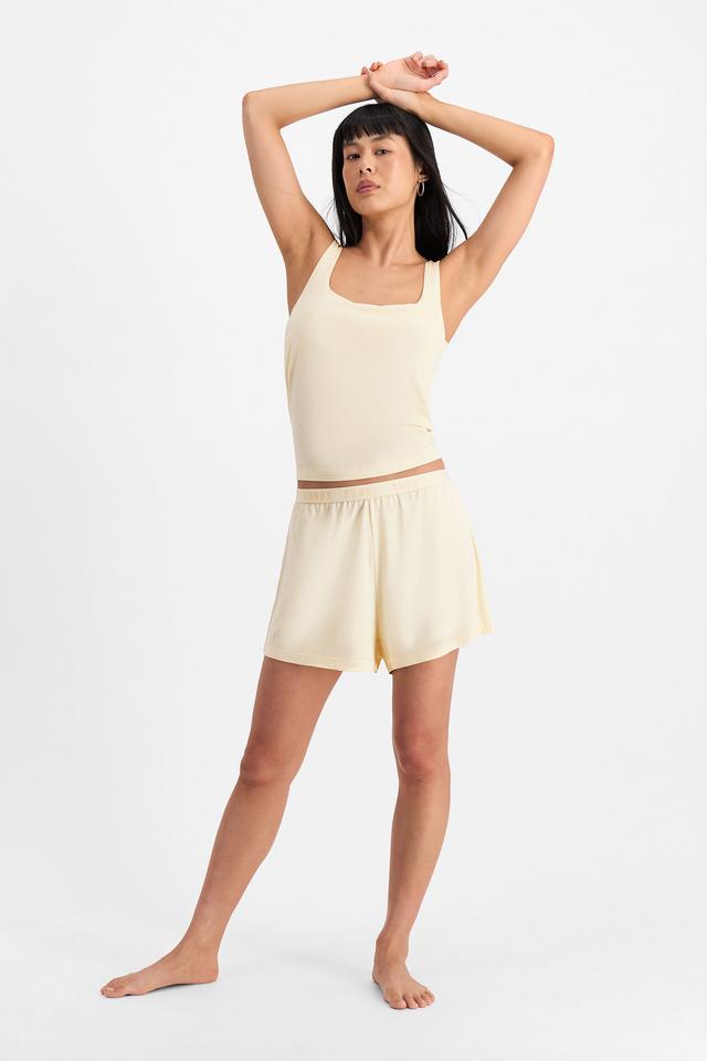 Nancy (She/Her) wears size S and is 170cm tall with 82cm chest and 64cm waist