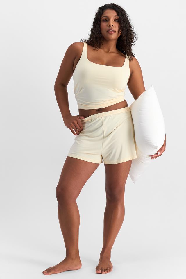 Camryn (She/Her) wears size S and is 106cm tall with 95cm chest and 74cm waist
