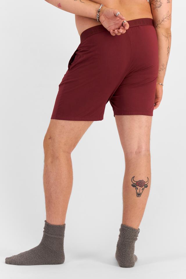 Jake (He/Him) wears size XL and is 195cm tall with 115cm chest and 106cm waist