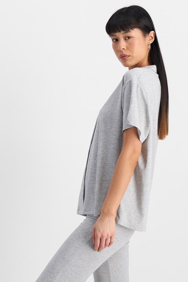 Nancy (She/Her) wears size S and is 170cm tall with 82cm chest and 64cm waist